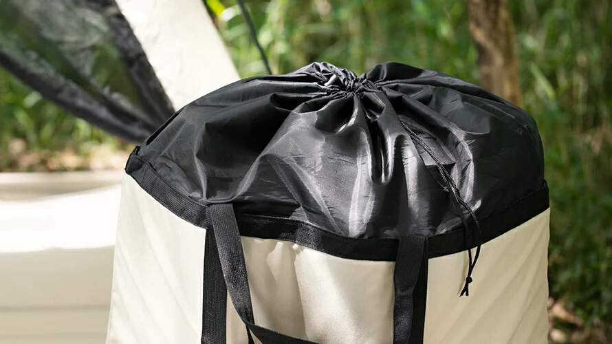 荷物の飛び出しを防ぐ巾着型